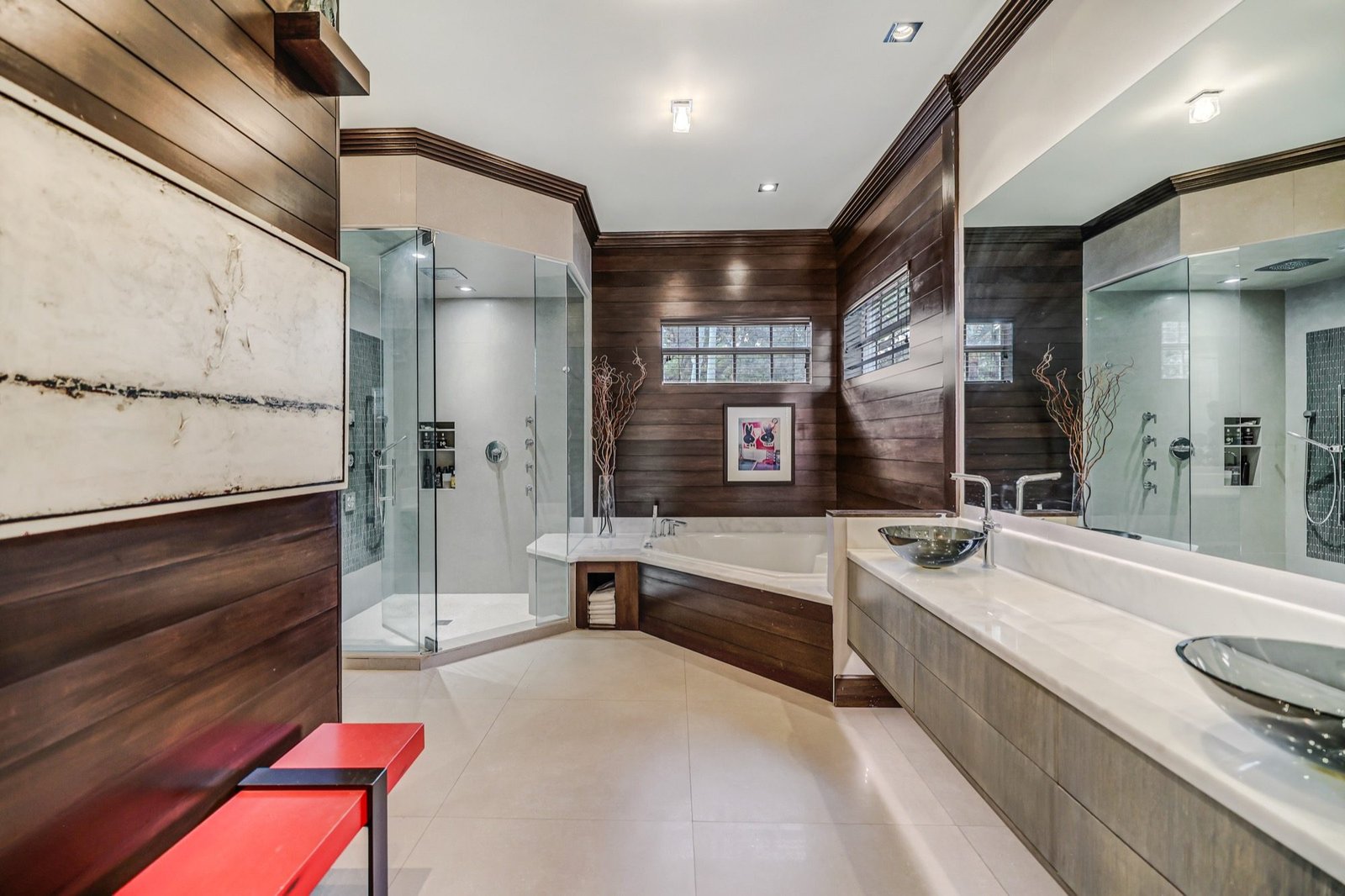 Primary bath with glass shower and soaking tub